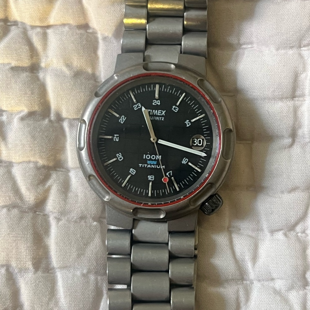 Vintage Timex Titanium Watch with Black Dial and Red Accent - Picture 2 of 3